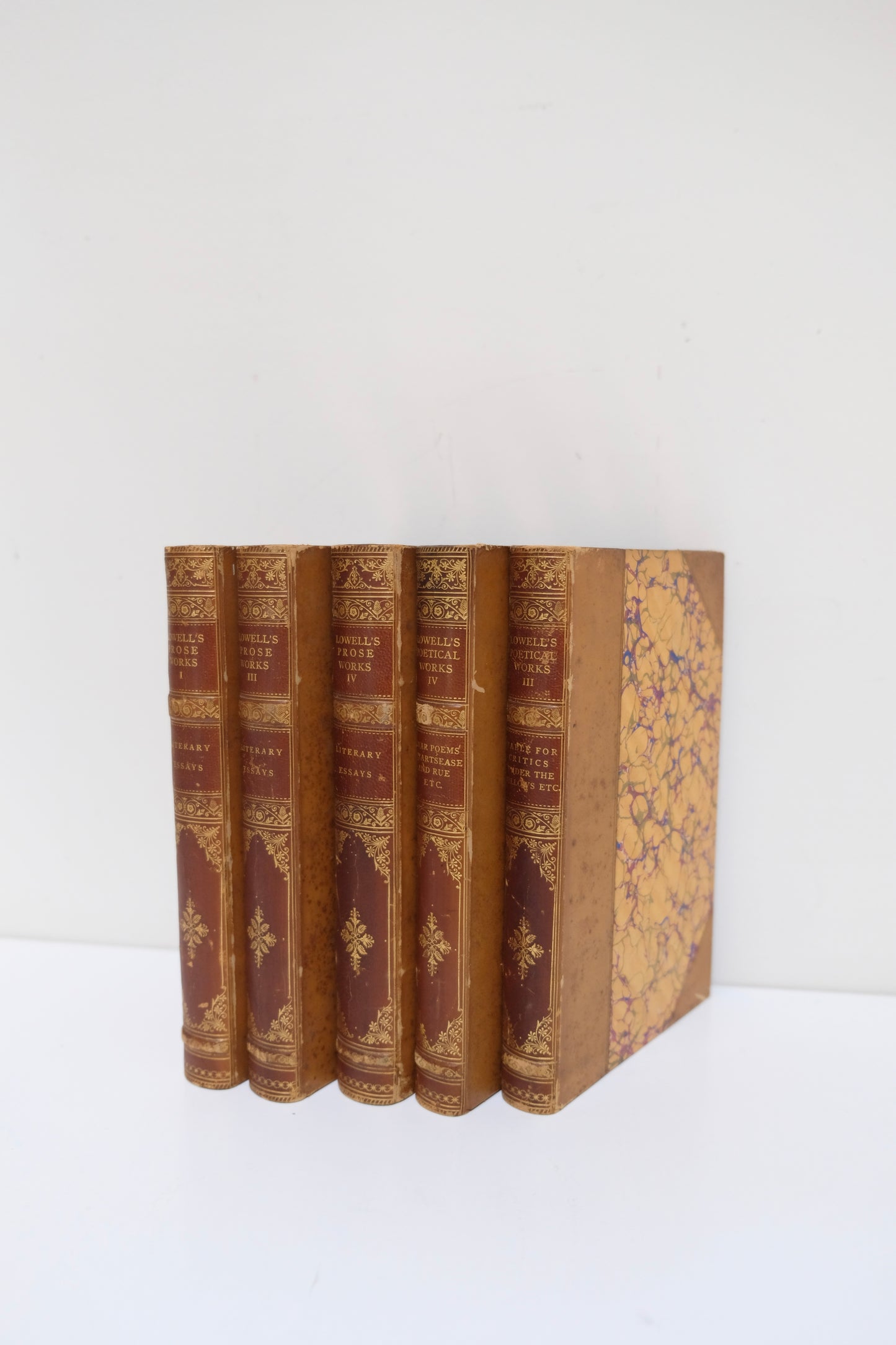 Five Antique Leather Lowell Volumes