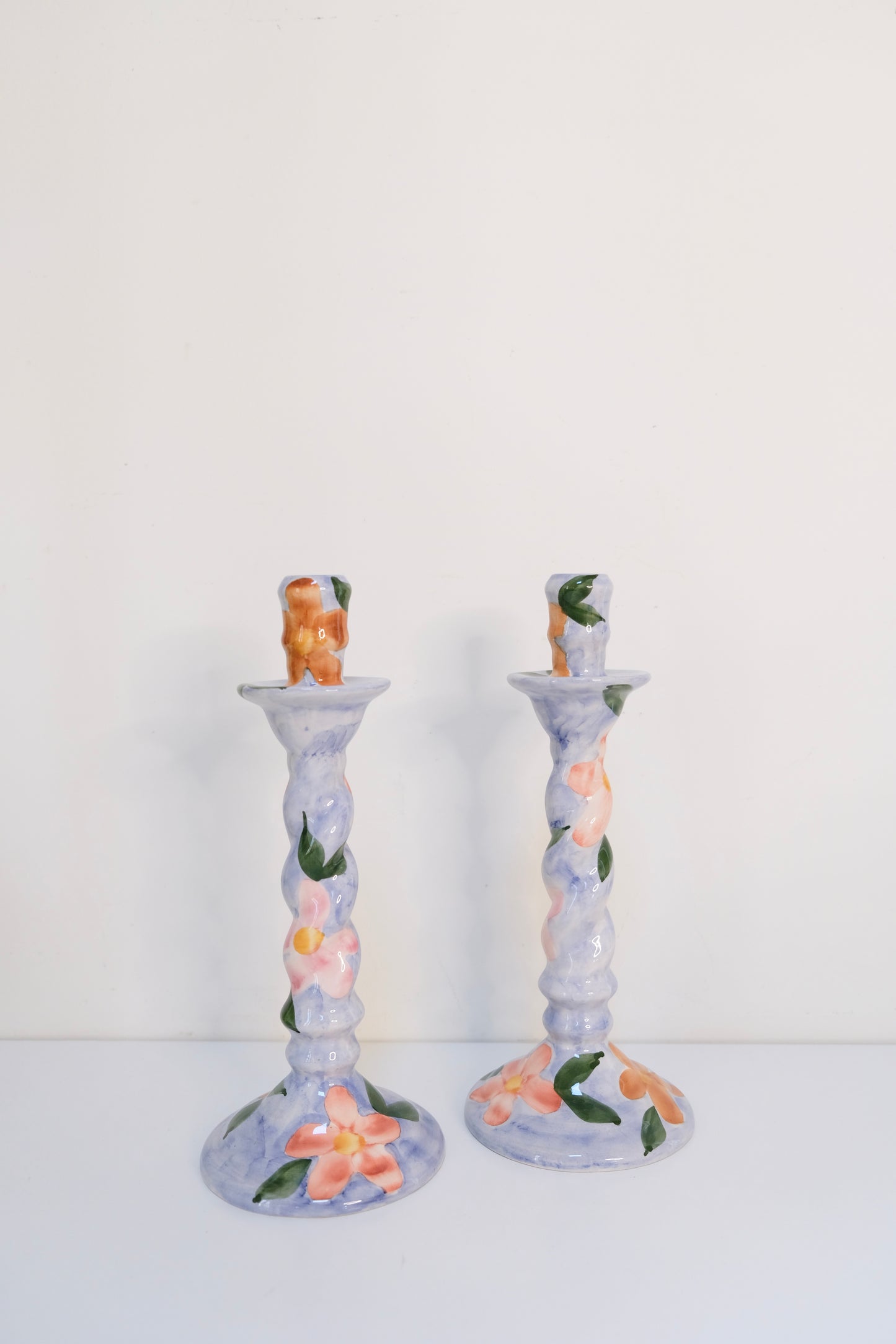 Set of Two Hand-Painted Ceramic Candlestick Holders