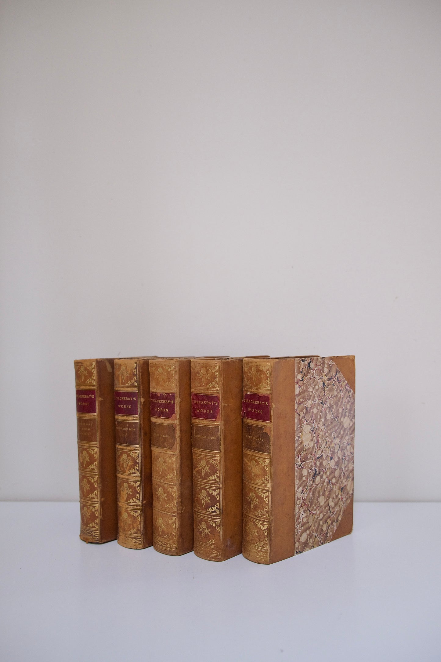 Set of Five Antique Gilded Leather Thackeray’s Works