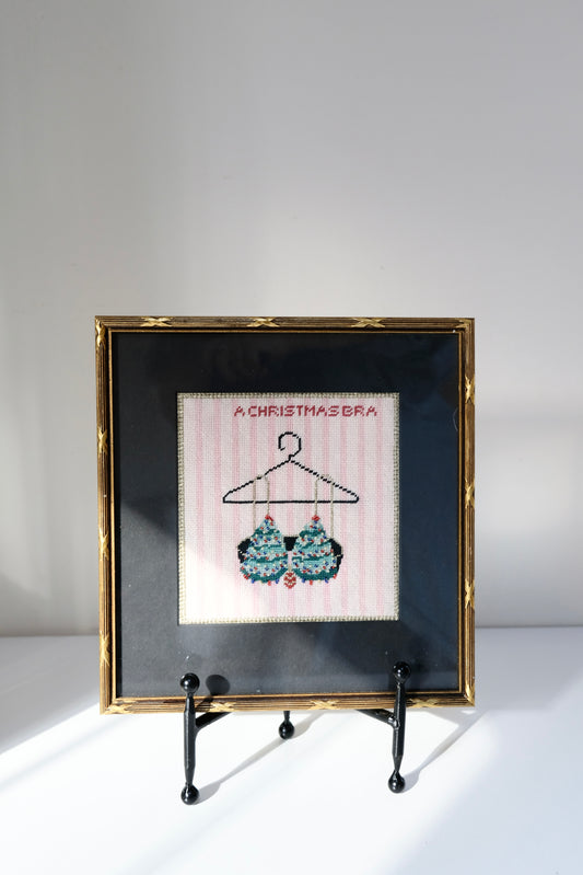 “A Christmas Bra” Vintage Framed Handmade Cross-Stitch