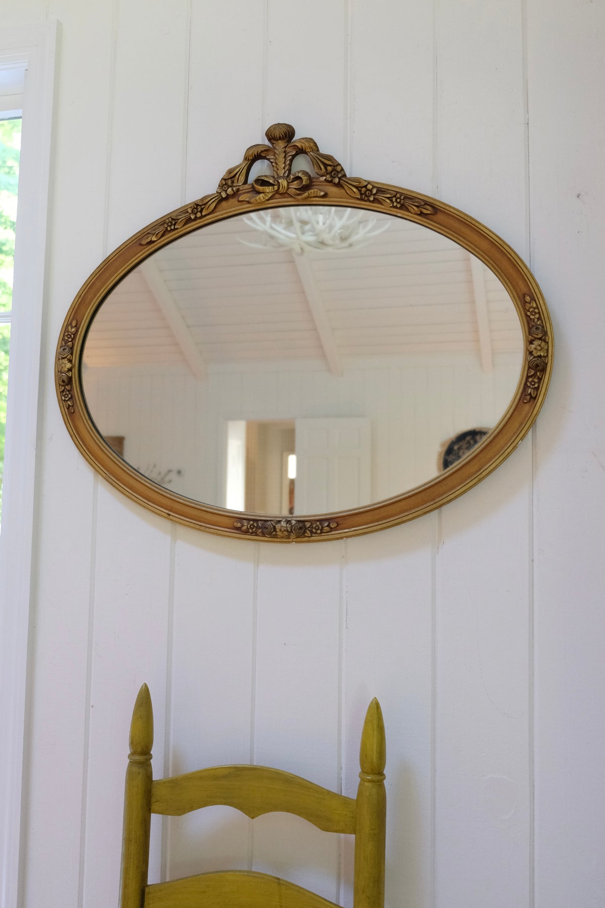 Vintage Carved Wood Gilt Oval Mirror with Floral & Bow Details