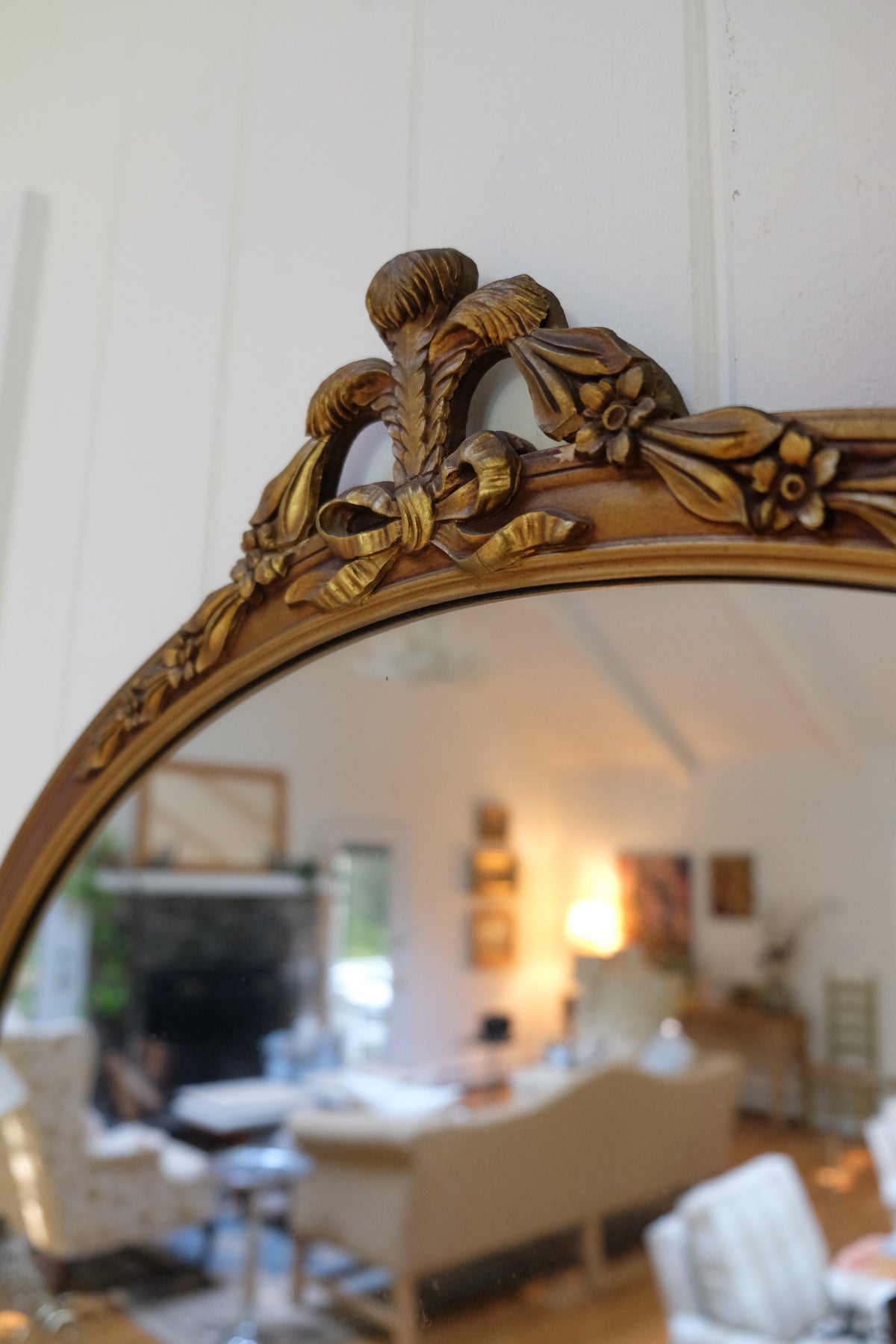 Vintage Carved Wood Gilt Oval Mirror with Floral & Bow Details